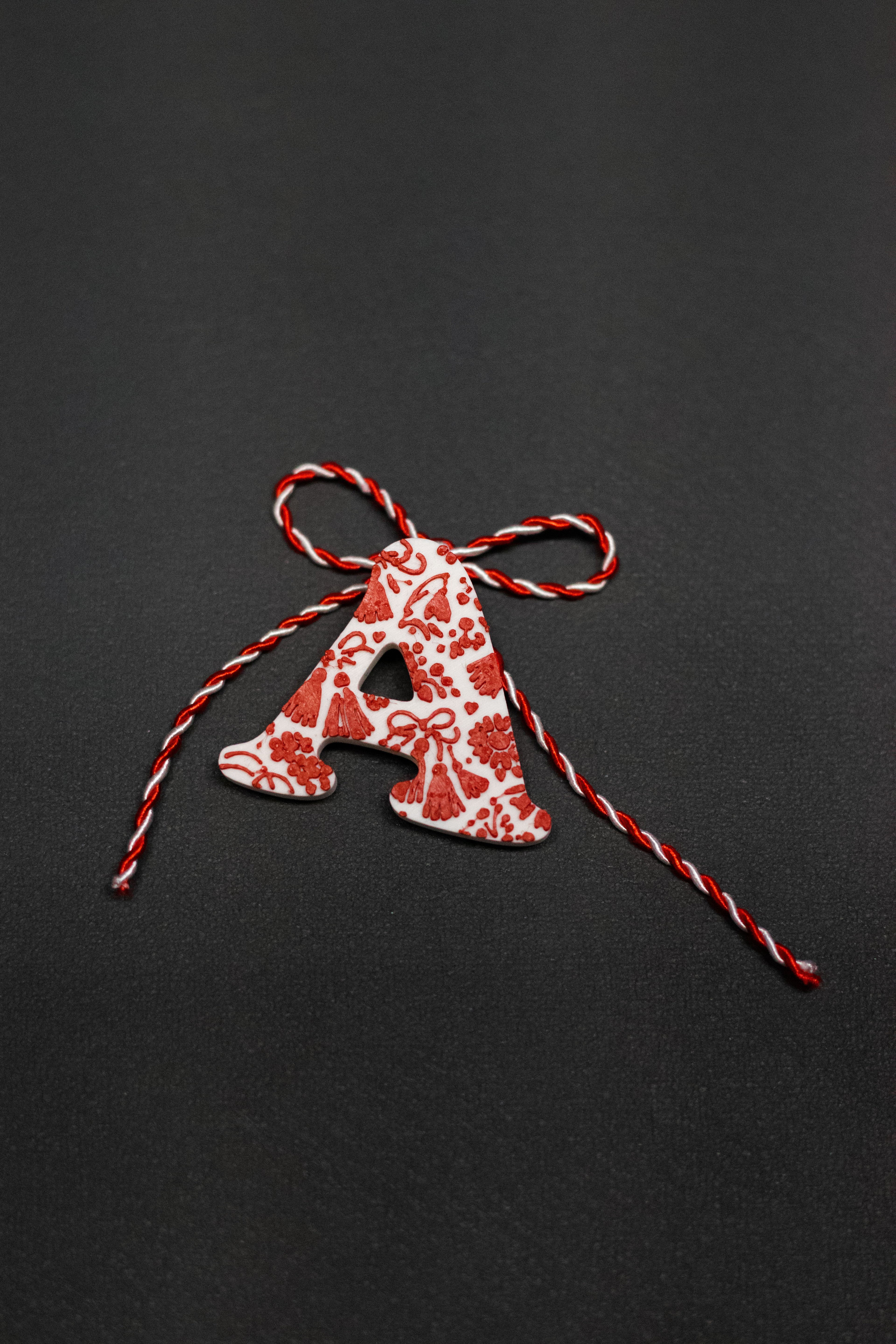 Inițială cu model Mărțisor